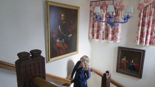 Curator Katherine Carter with the restored Marlborough portrait